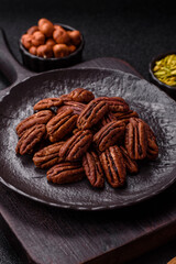 Nut, pecans in a ceramic bowl, an ingredient in vegan food