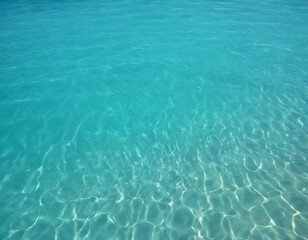 Obraz premium Crystal-clear water surface with subtle waves, natural reflections, bright and fresh look, professional stock photo style