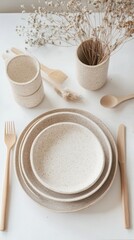A Fine Dining Table Setting with Neutral Colored Tableware