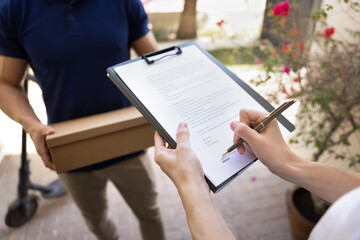Professional doorstep delivery. Close up cropped view female recipient, delivery services client...