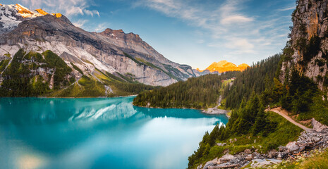 Naklejka premium Untouched beauty of the rocky basin of Oeschinensee lake. Location place Swiss alps, Switzerland, Kandersteg, Europe.