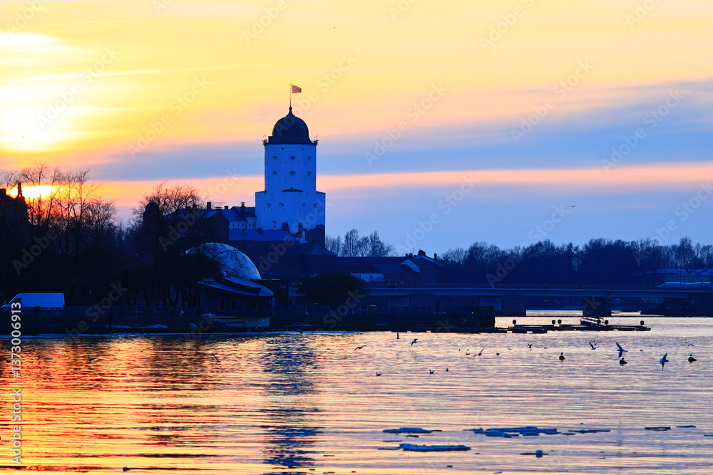 Poster A serene lake scene with a tower visible in the distance, perfect for use in travel or architecture images.