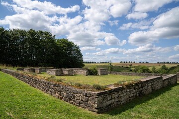 Ancient stone ruins on a grassy hill