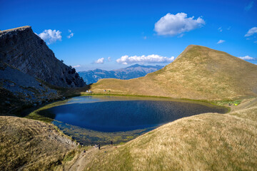 Obraz premium Drakolimni of Tymfi. The lake resides at an altitude of 2050m above sea, in Vikos National Park in Greece.