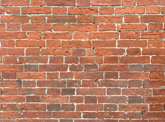 Aged red brick wall background. Сloseup. Space for text.