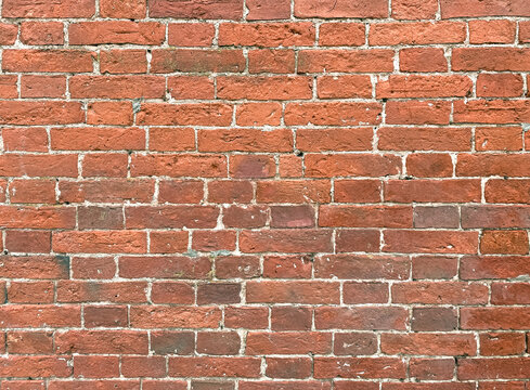 Fototapeta Aged red brick wall background. Сloseup. Space for text.