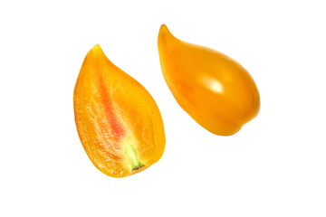 Yellow, orange tomato whole and cut in half, on white background. Fresh and ripe. Top view
