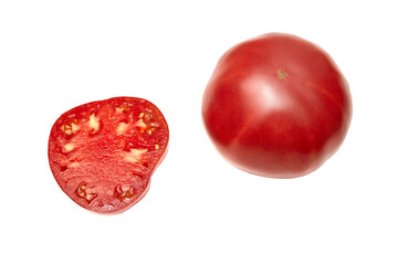 Red tomato whole and cut in half, on white background. Fresh and ripe. Top view