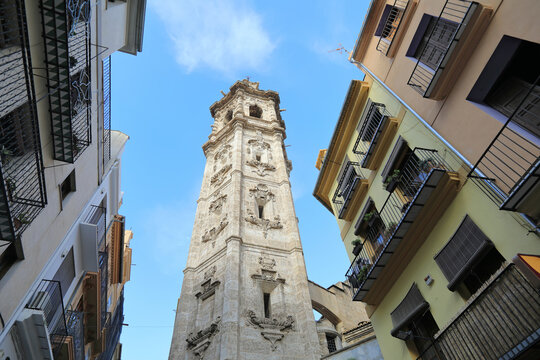 View of the Campanario de Santa Catalina - bell tower of St Catherine Church surrounded by residential houses. City of Valencia, Spain