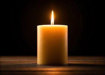 A solitary candle flame burns brightly, offering hope and remembrance in the quiet darkness of night on a rustic wooden surface.