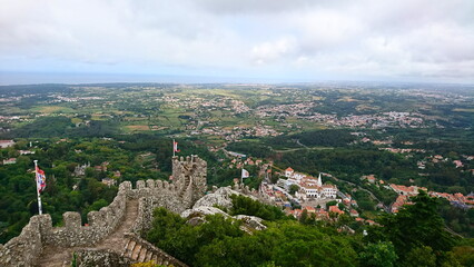 A panoramic view from the ramparts of Castle of the Moors overlooking lush greenery