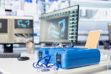 Computer software in photovoltaics factory used for optimizing production flow. PC program in empty sustainable energy solar panels plant used for monitoring manufacturing process