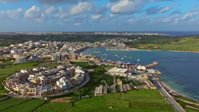 Traditional fishing Marsaxlokk village. Maltese island, drone view