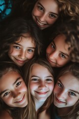 Obraz premium Friendly cheerful faces of young girls gathered together