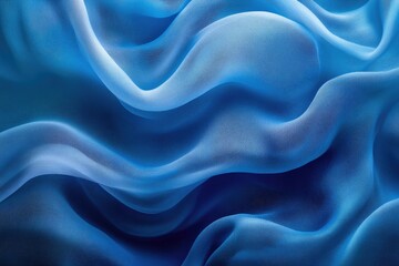 Fototapeta premium Abstract flowing blue fabric creates soft, elegant waves with light and shadow interplay, showcasing texture and depth.