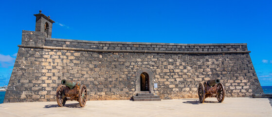 Front facade and two cannons of the castle of San Gabriel in Arrecife-Lanzarote-Canary Islands-Spain © Pedro Emanuel 