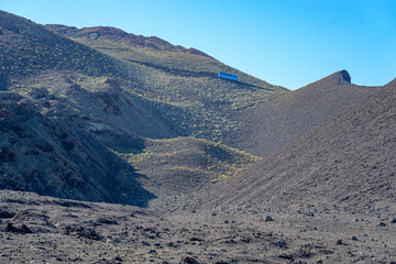 Tourist bus in Timanfaya park located on the island of Lanzarote - Canary Islands - Spain