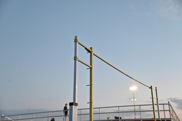 Pole Vault Bar at a Track Stadium