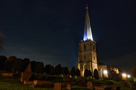 Painswick Spire at Twilight Silhouetted church spire against dusk