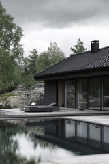 Fototapeta premium Modern architectural design of a sleek home overlooking a tranquil pool amidst rocky terrain and lush greenery on an overcast day