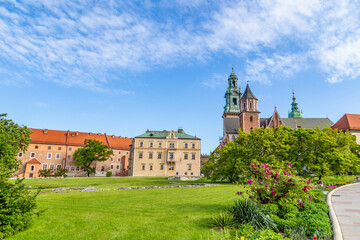 Wawel castle on sunny day with blue sky and white clouds