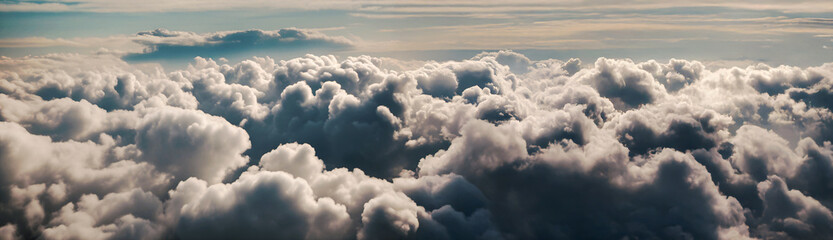 Panoramic Aerial View of Fluffy White Clouds Above Sky, banner