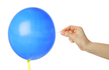 Woman popping blue balloon on white background, closeup