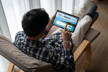 Obraz premium Online hotel accommodation booking website provide modish reservation system . Travel technology concept .