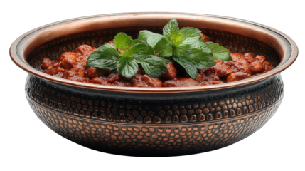 Indian butter chicken curry in a balti dish on a white background
