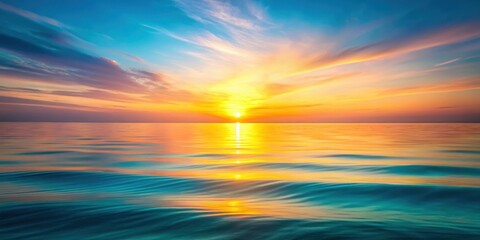 Obraz premium Serene Ocean Sunset Vibrant Hues of Orange, Yellow, and Teal Reflecting on Calm Waters