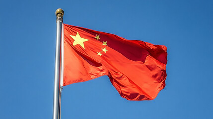 Chinese National Flag Waving Against a Clear Blue Sky