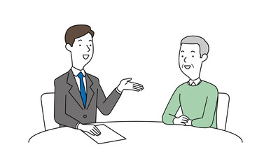 男性の相談員にアドバイスを聞く高齢の男性