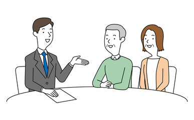 男性の相談員にアドバイスを聞く高齢の男女