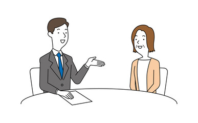 男性の相談員にアドバイスを聞く高齢の女性