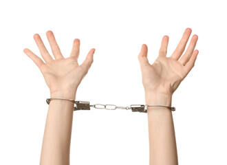 Female hands in handcuffs isolated on white background