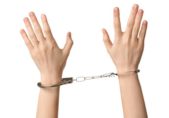 Female hands in handcuffs isolated on white background