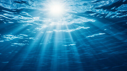 Fototapeta premium Sun shining through water creating a soft and dreamy scene of light and reflection in the ocean depths evoking tranquility and peacefulness.
