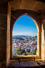 Obraz premium Lisbon Portugal 18th Jan 2025:The view of Lisbon's cityscape from Castelo de S. Jorge is breathtaking, offering a stunning panorama of the historic rooftops, winding streets, and the Tagus River