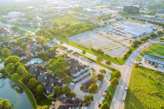 Overview of suburban neighborhood with homes, pool, vacant commercial lots in Sayreville town New Jersey