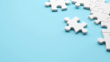 Obraz premium White Puzzle Pieces On Light Blue