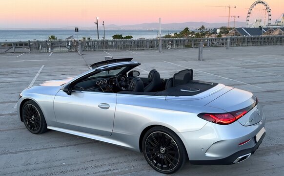 Mercedes CLE 200  Convertible car on the beach