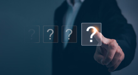 Hands holding FAQ question mark sign. Question Mark and Problem-Solving Concept. Finding answers to business FAQs. Creativity and ideas, asked questions and answers. Brainstorming and problem-solving.