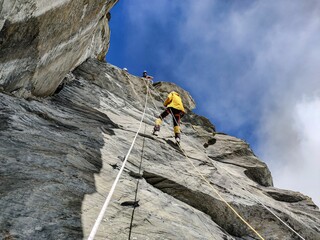 climber on the top of the mountain
