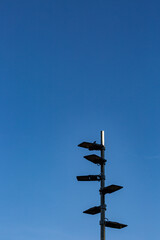 Street lamps and empty blue sky