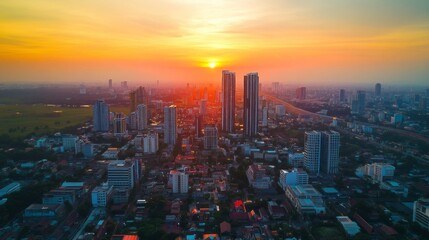 Fototapeta premium Stunning sunset over urban skyline cityscape photography modern architecture evening atmosphere aerial view urban beauty