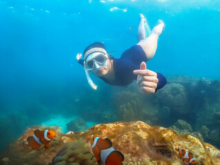 Beautiful  snorkeling in the tropical sea.Travel lifestyle, watersport adventure, swim activity on...