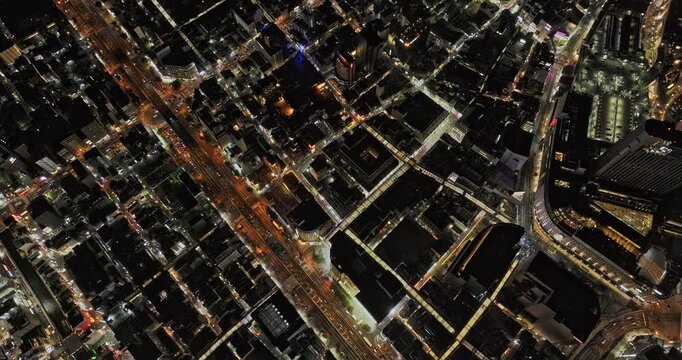 Osaka Japan Aerial v111 high altitude vertical flyover Namba, Nanbasennichimae and Nipponbashi capturing views of downtown area and street traffics at night - Shot with Mavic 3 Pro Cine - Oct 9th 2023