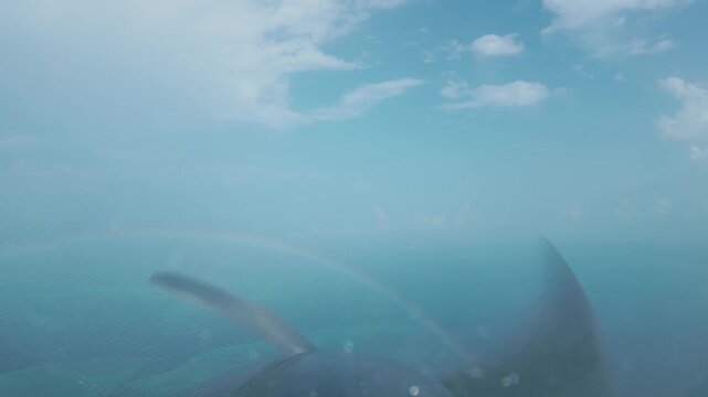 Propeller Of Cessna 208B Grand Caravan In Flight, POV Through Cockpit Windshield