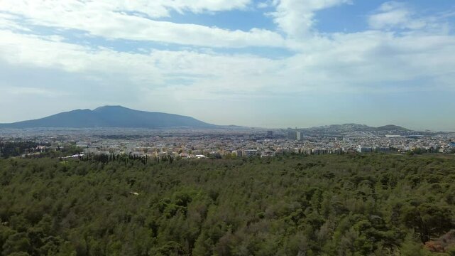 Aerial panoramic footage of Attica basin , taken from Syggrou Grove, Ymittos mountain on background 4K