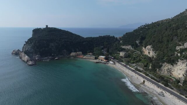 coastal lookout in northwestern Italy near Spiaggia del Malpasso and the clear coastal waters near the highway and picturesque cliffs